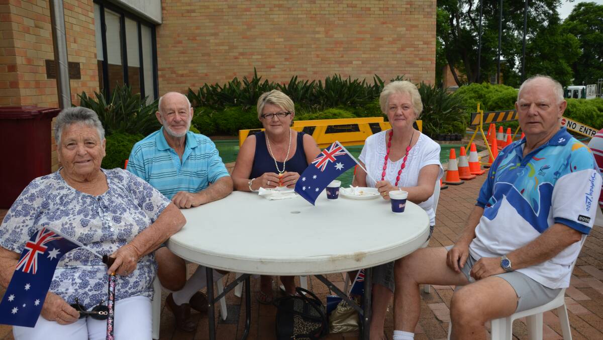 Lights showers did not dampen the spirits of the Singleton community on Australia Day with good crowds attending the morning ceremony in the Civic Centre.
