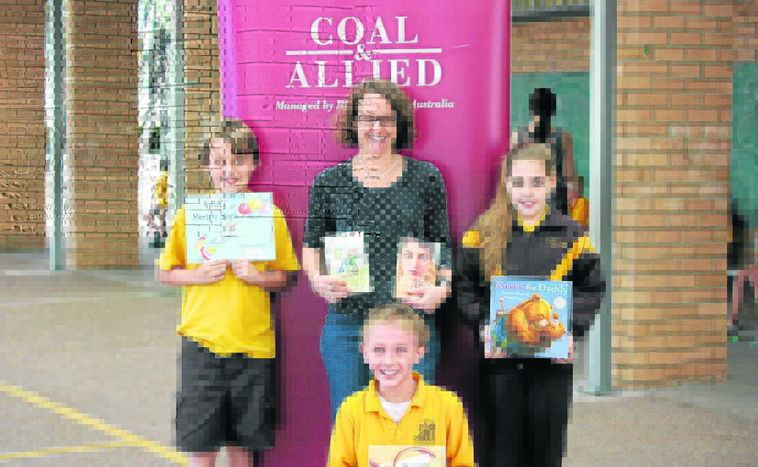 LOVE OF READING: Author Frances Watts with Singleton Heights Public School students during the Upper Hunter Book Week celebrations. 
