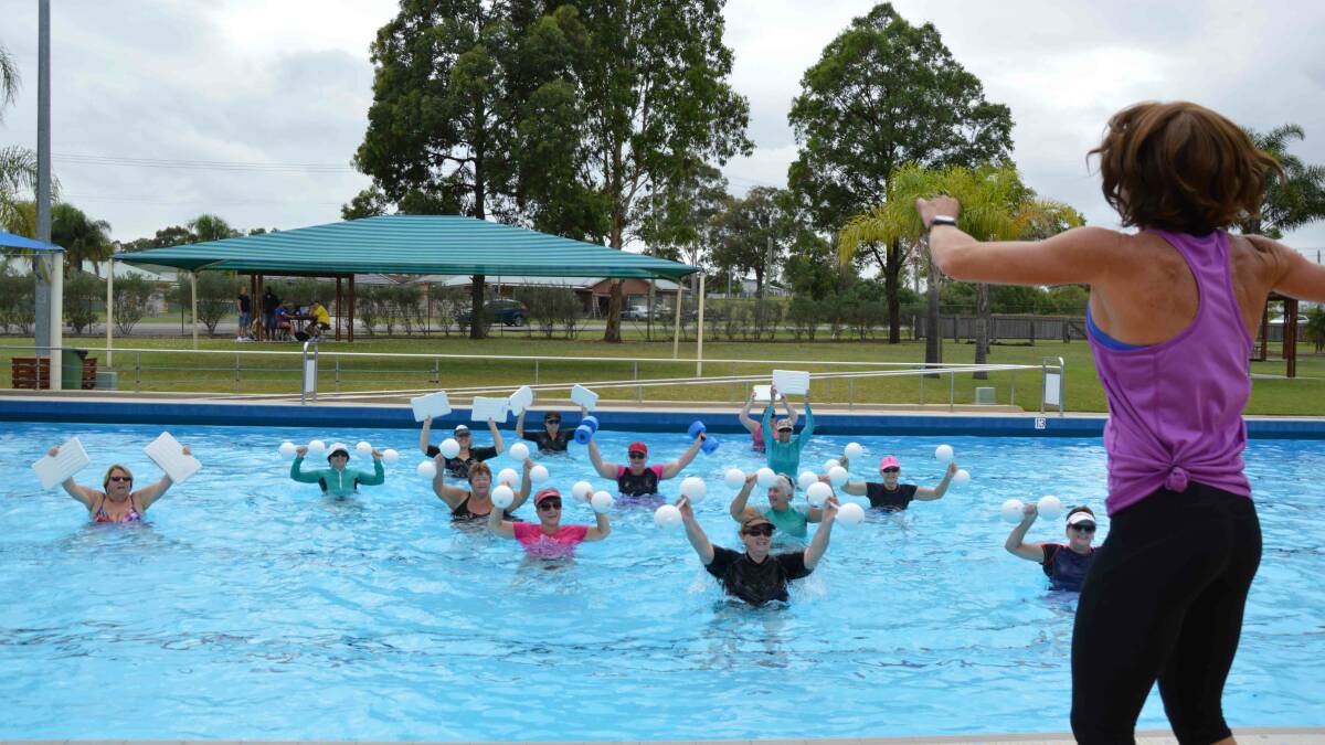 Instructor Tracey Crossley puts the aqua aerobics group through their paces.
