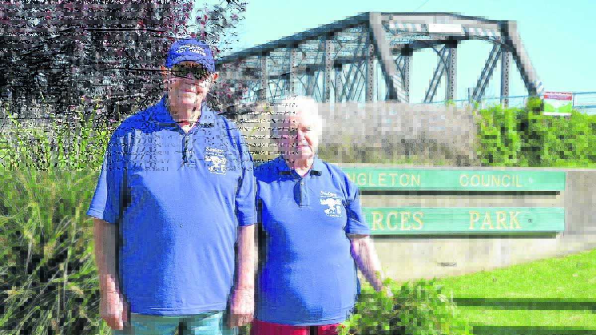 COMMUNITY SPIRIT: Singleton residents Kath and Bill Pearce, who are
instrumental in looking after “their patch”, Pearces Park, near Dunolly Bridge.