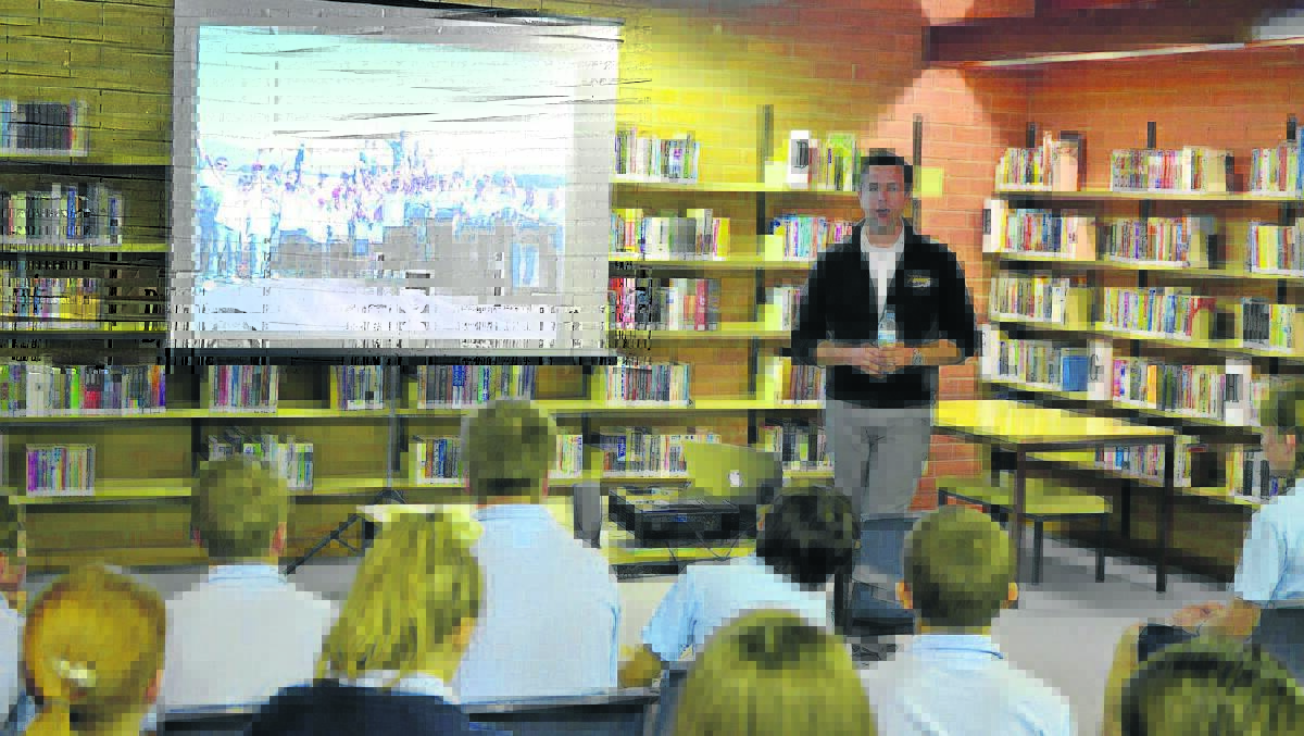 OVERCOMING THE OBSTACLES: Ryan Campbell talks Singleton High School students about flying around the world. 