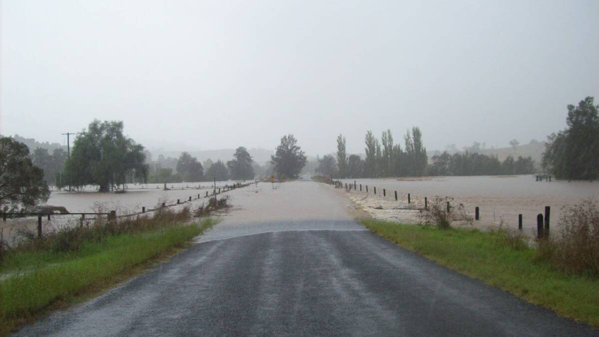 Mirannie Road under water in many areas. Photo: Pam Hall. 