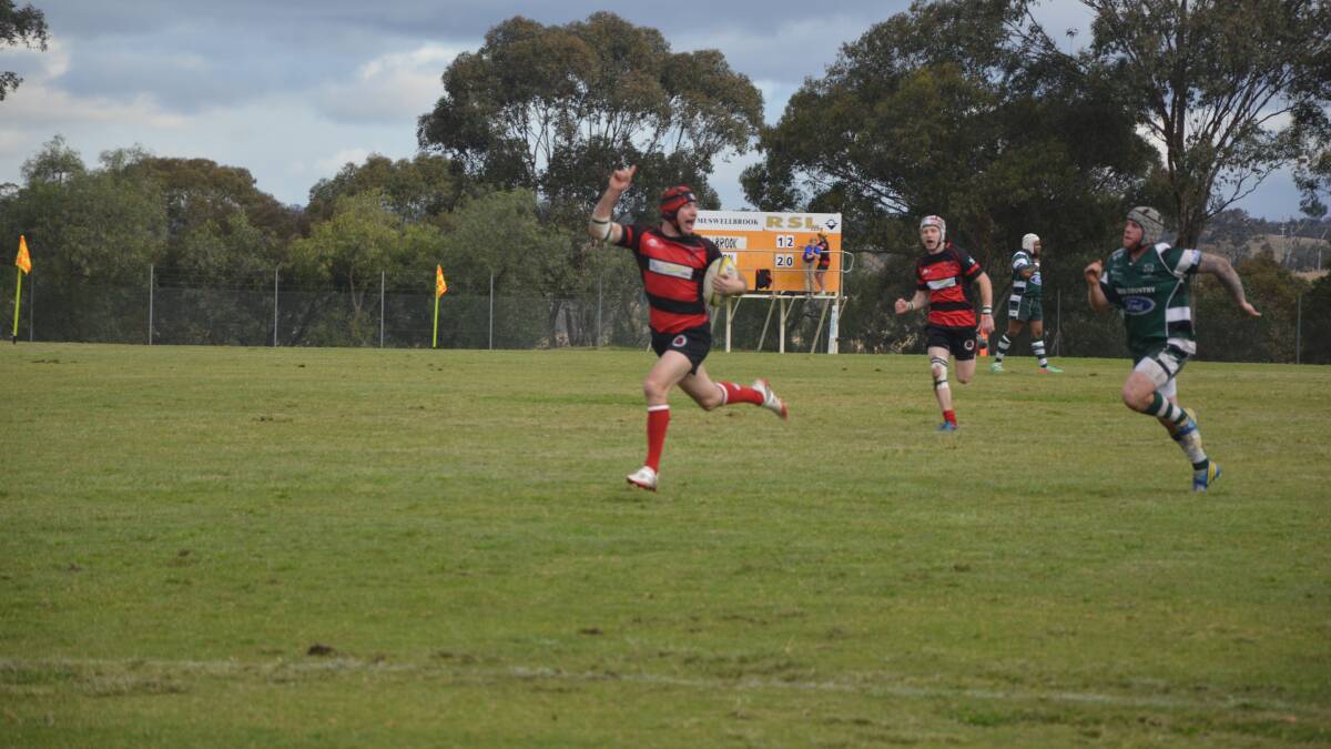 Daniel Bates finishes the game with an intercept try (also pictured Alex Dunn).