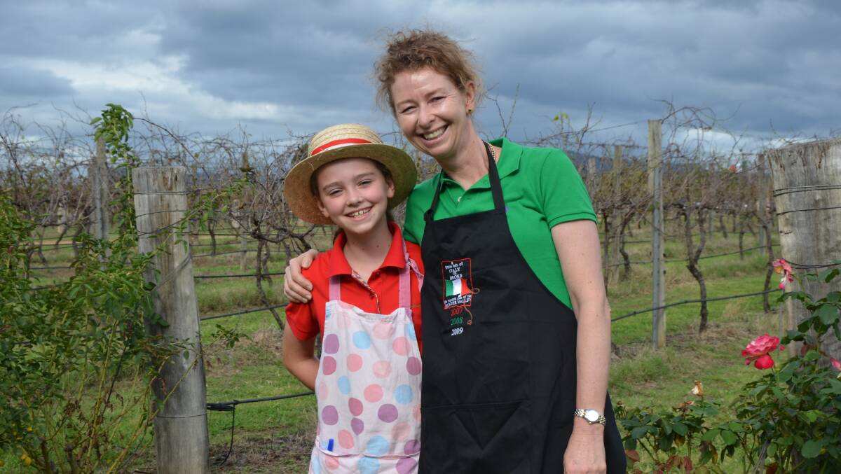 ALL HANDS ON DECK: winemaker Susan Frazier enlists the help of her daughter Alexandra for a Little Bit of Italy.