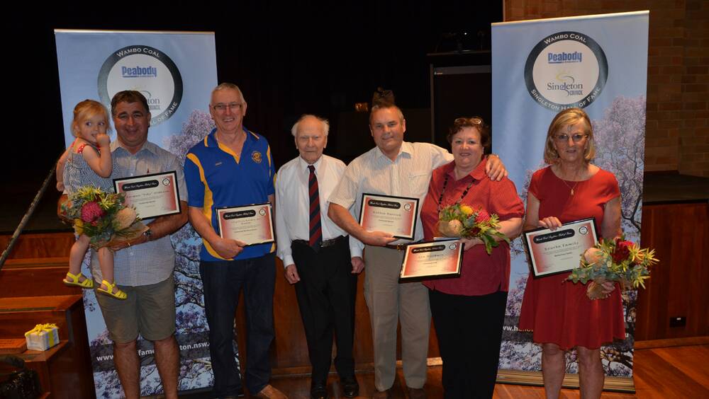 HALL OF FAME INDUCTEES: From left, Steve Oldknow (with Olivia Oldknow), who accepted the award on behalf of Norman “Esky” Oldknow, Rotary Club of Singleton on Hunter’s David Gausden, Neil McNamara, Robbie Merrick, Lyn MacBain and Ruth Klassen, who accepted on behalf of the Bourke Family. 