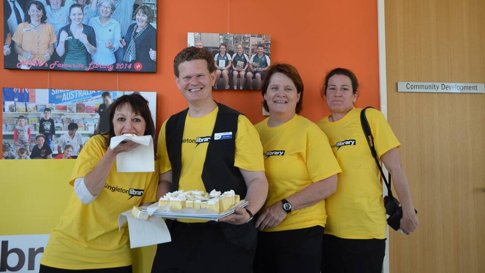 FUN DAY: Singleton Public Library coordinator Alex Mills celebrates their 10th birthday with staff members, from left, April Dowd, Kerrie Taylor and Nicole Lonsdale on Wednesday.