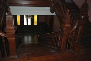 The grand staircase of Minimbah homestead.