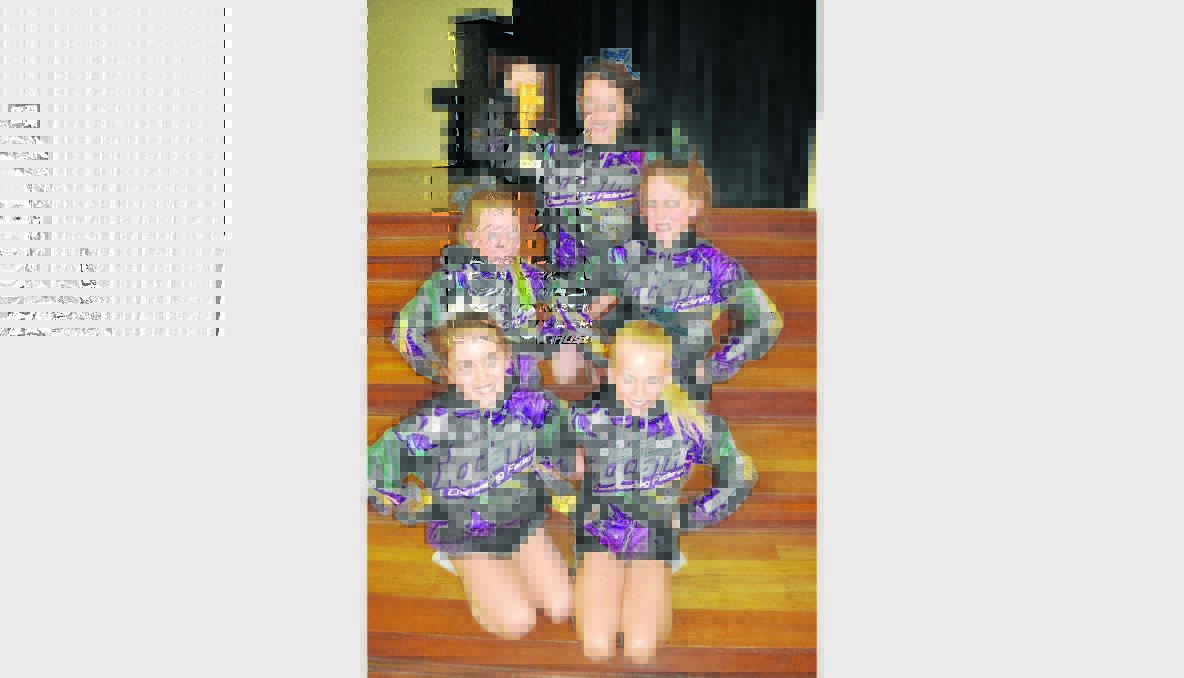 NATIONAL CHAMPIONS: Members of the Oxygen Allstars cheerleading group that gained  first place  at the national cheerleading  championships were (back) Abbie Darr (middle) Kasey McCarthy and Charlotte Daniel (front) Lexie Wholert and Jemmason Renfrew.