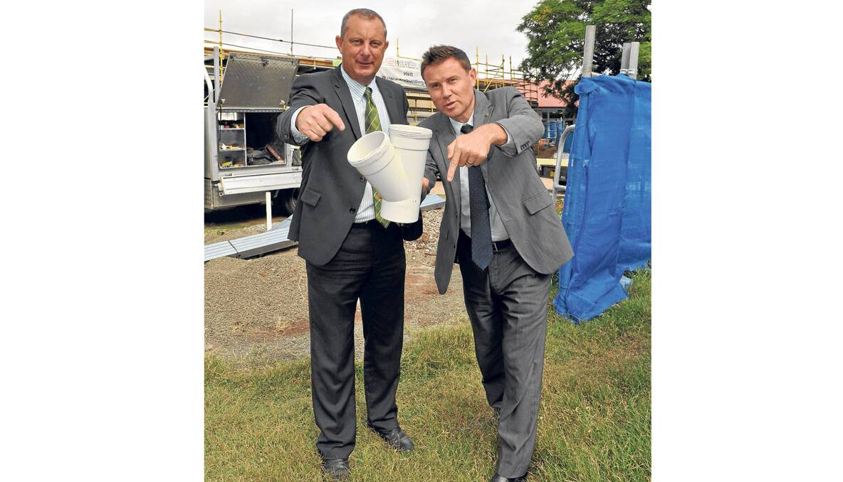 Money down the drain: Nationals Candidate for Hunter Michael Johnsen with Shadow Parliamentary Secretary Regional health Services Andrew Laming believe the carbon tax should be flushed down the drain.