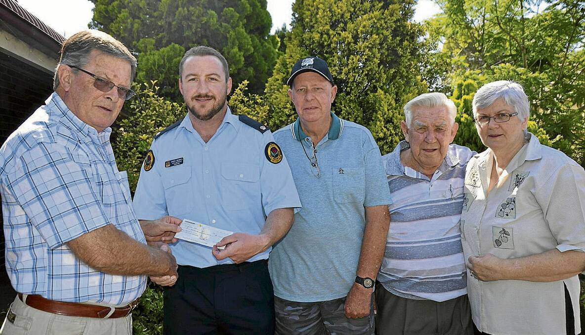 GOOD DECISION:  Singleton State Emergency Service was the recipient of proceeds from this year’s fund raising annual event by the Retired Mineworkers Association of Singleton.  Local SES controller Simon Merrick is pictured (second from left) receiving a cheque from the association’s vice president Ian Paget.  Also pictured (l-r) are association members David Gilmore, Bill Griffiths and Alice Muller.