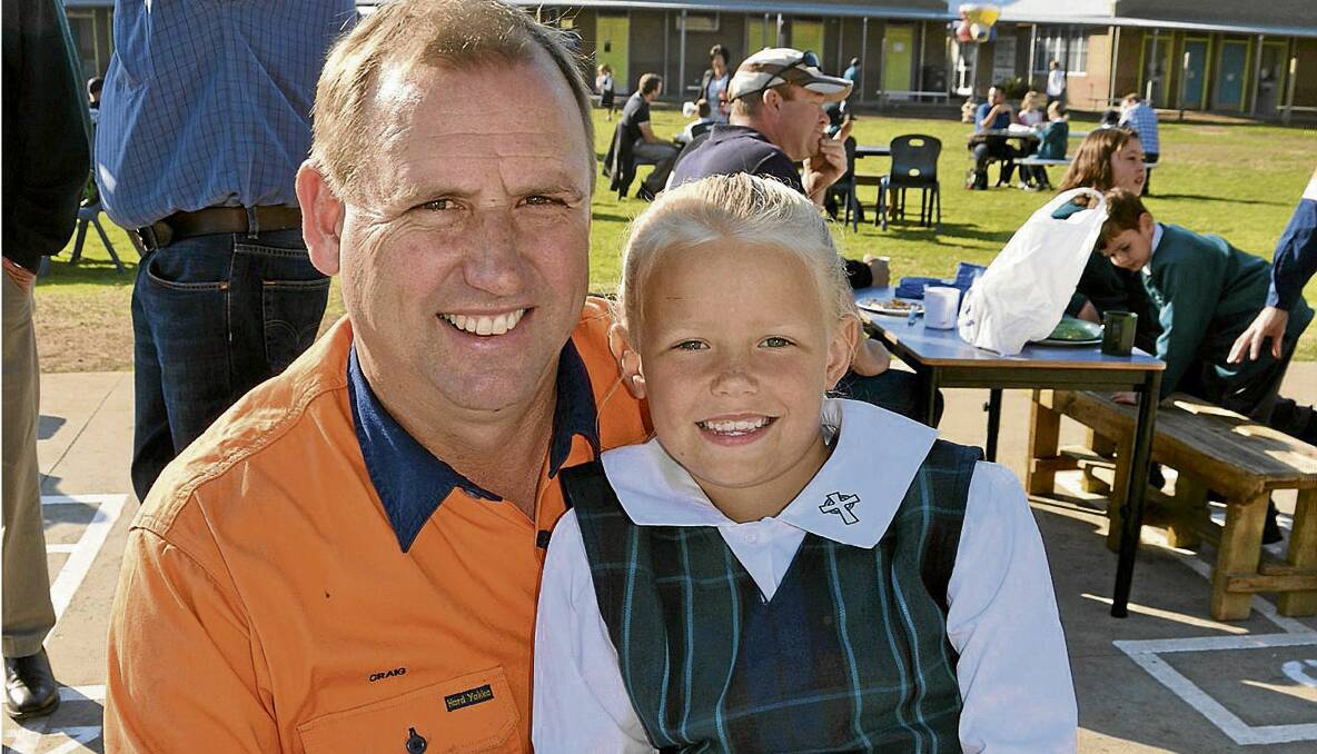 BREAKFAST WITH DAD: Craig Gradwell enjoyed sharing his breakfast last Friday with his daughter Keira at St Catherine’s Catholic College special Father’s Day Breakfast. 