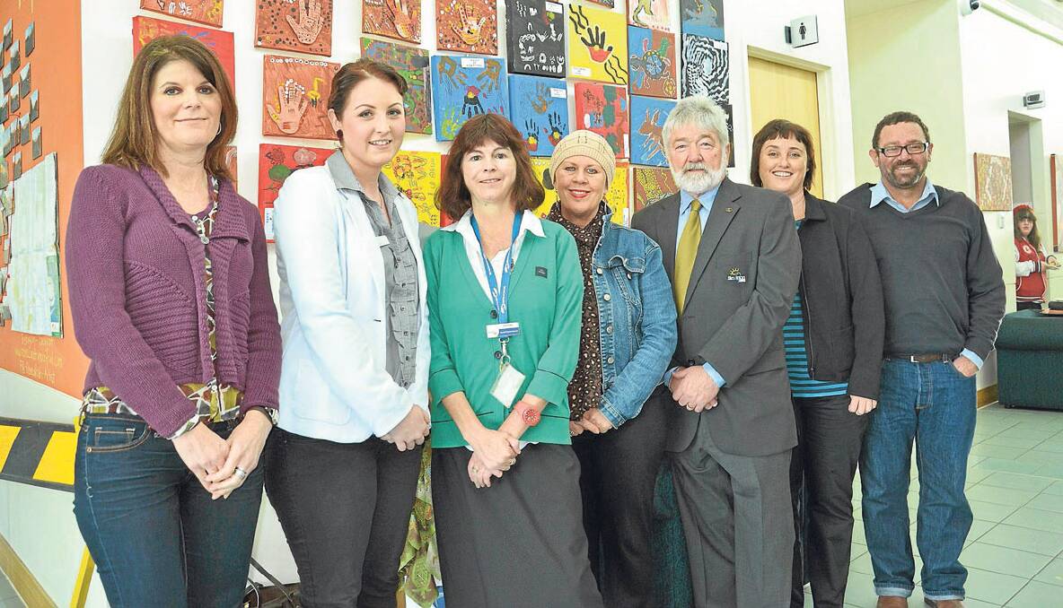 LEARNING: (L-r) State Records acting manager Rhonda Campbell, Upper Hunter Aboriginal youth worker Jill Perkins, Singleton Library information services Sharon Muir, Singleton TAFE Jenny Campbell, deputy mayor Godfrey Adamthwaite, State Library Indigenous Unit coordinator Kristen Thorpe and Indigenous Services Librarian Ronald Briggs.