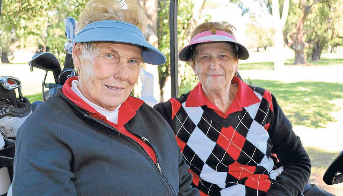 VISITORS ENJOY DAYS GOLF:  Beresfield golfers Jill Copeland (left) and Betty Griffiths enjoyed a round of golf at the Singleton Golf Club’s open day on Tuesday. 