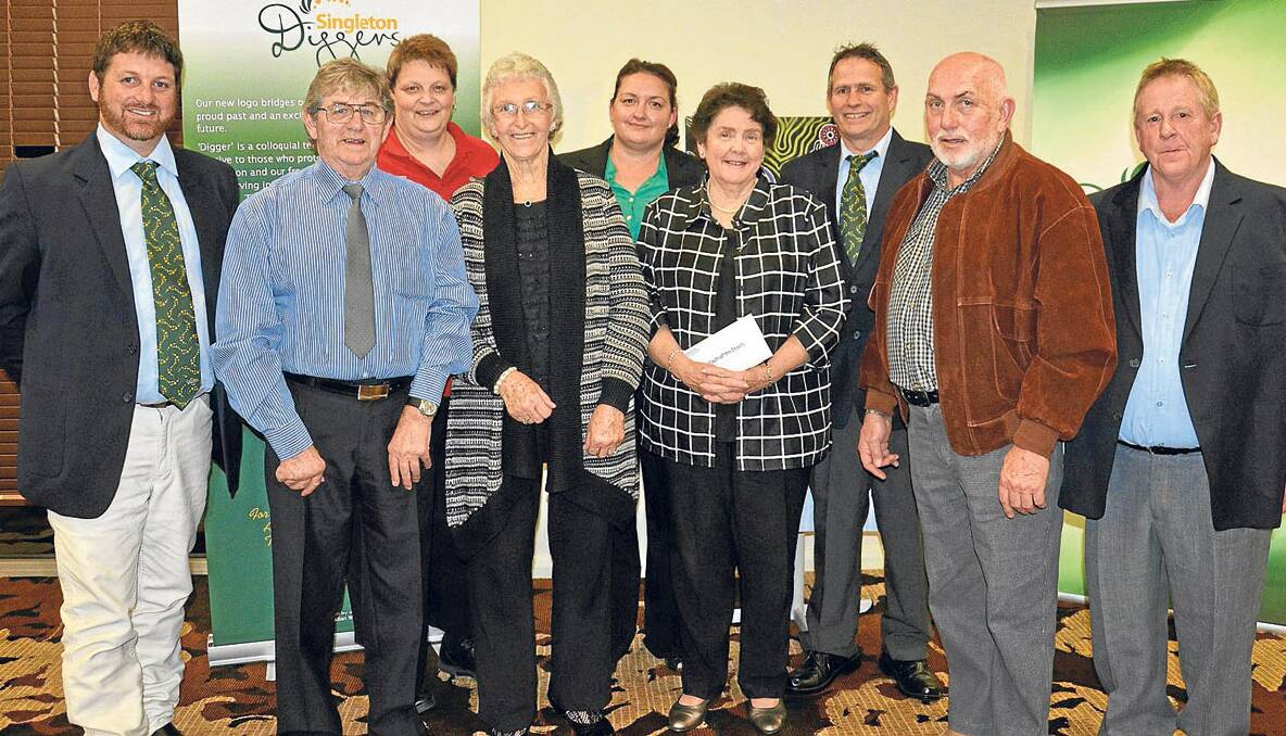 REWARDS:  Diggers director Craig Hargreaves, Janice Lawrence, Justine Russell, Ken Richardson, (front) Bill Oliver, Jan Goodwin, Joy Patton and Gary Holland at the Community Chest presentation last Thursday night.