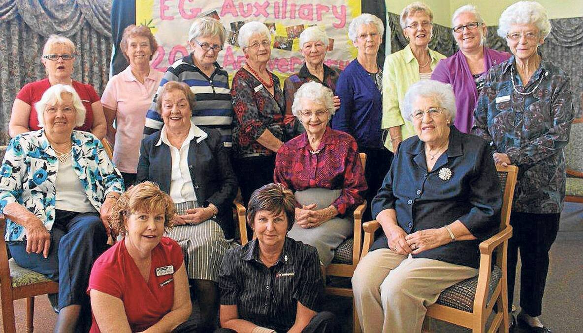 HELPING HANDS:  (Back left to right)  Sharon Cox, Rose Sangster, Eon Mc Donall, Jan Hudson, June Neely, Val Smith ,Audrey Shade, Diana Thorning, Betty Searl  (middle) Barbara Schmierer, Shirley Braye, Bron Dorsman,Shirley Clements, (front) Cindy Macdonell and Marie Bates.