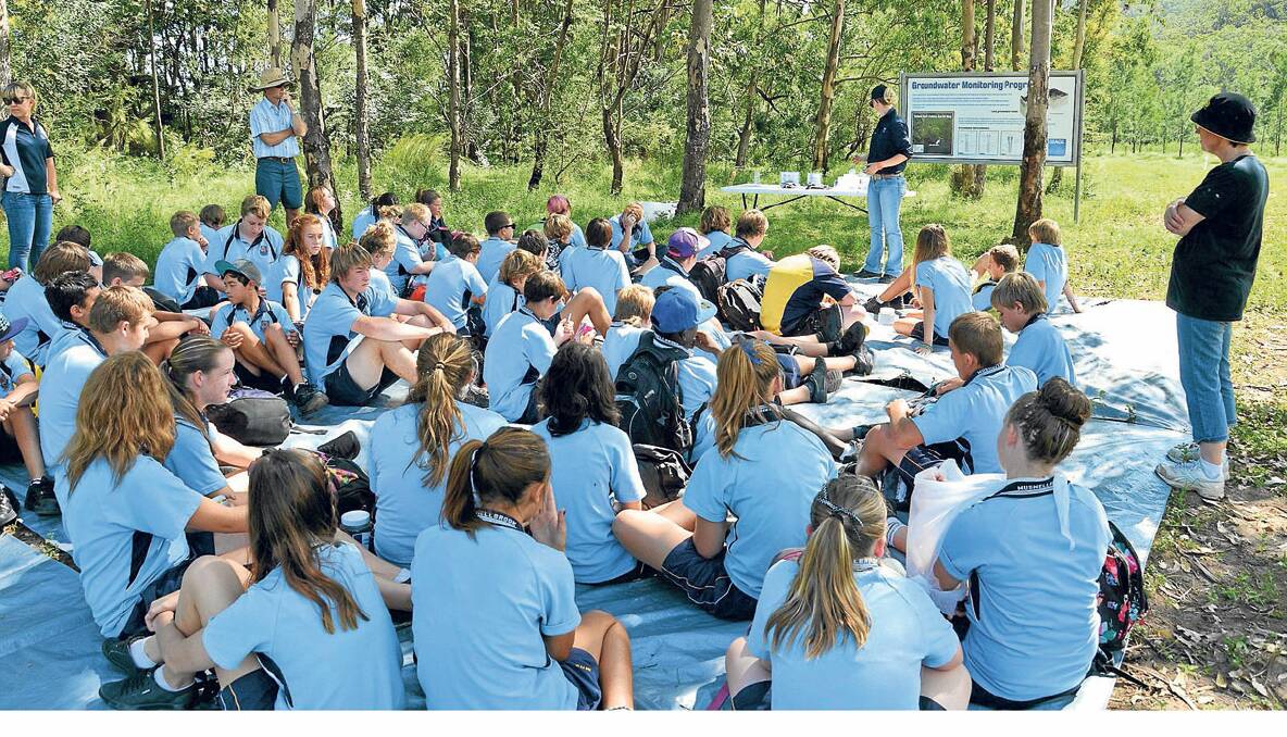 VISIT:  Students from Muswellbrook High listen as AGL representatives explain the coal seam gas mining exploration project at Yellow Rock at Broke.