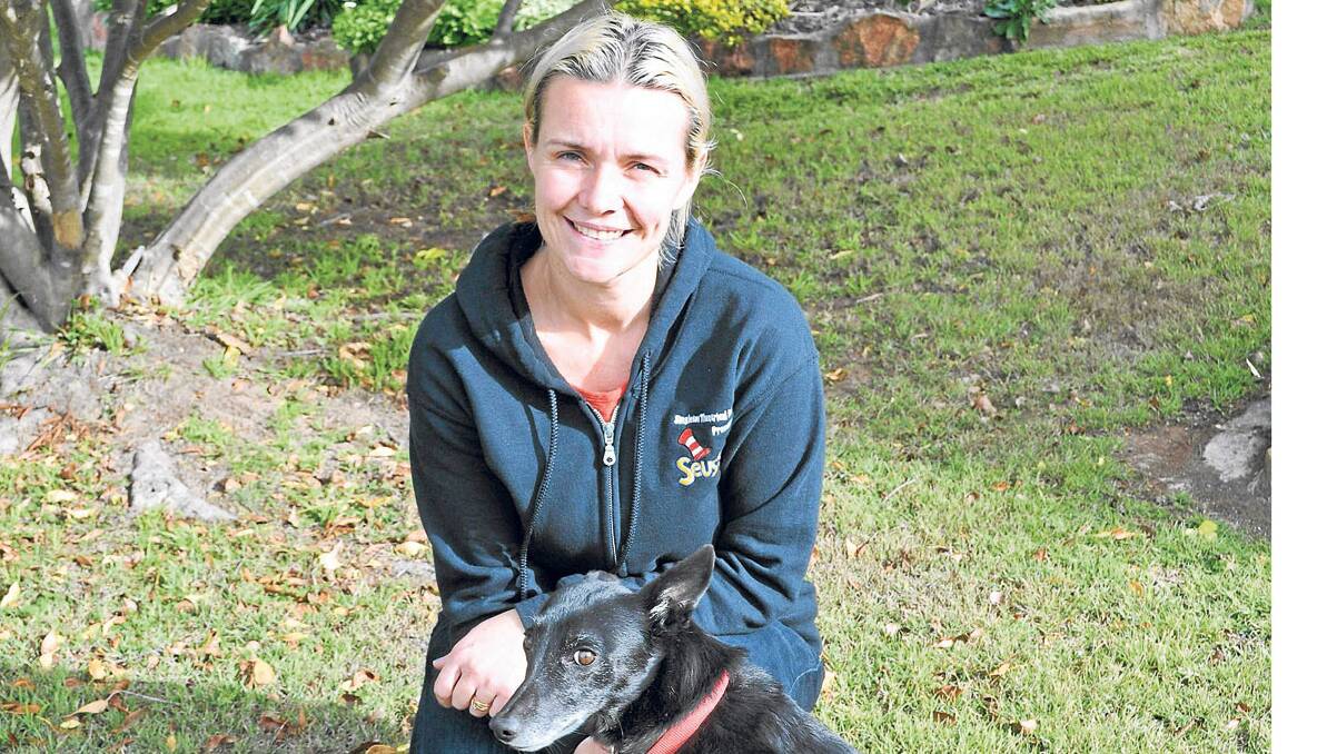GOOD JOB:  Alison Lee and her dog,  Shadow.  In the future Alison would like to see incentives introduced for individuals, like her, that choose to collect litter from parks and streets.