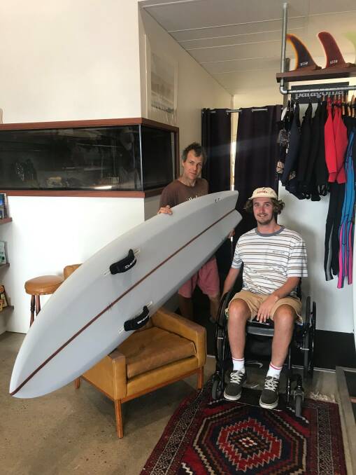 Jed Done (left) with a custom made board for Appsy. 