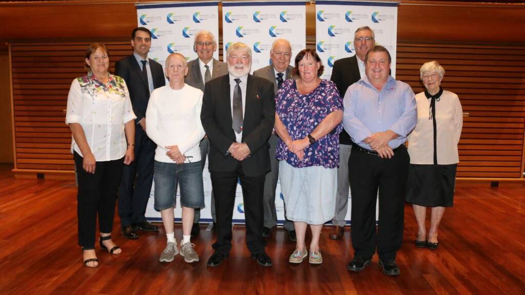 Wambo Coal Manager Environment and Community Peter Jaeger, the Hon George Souris, Gerard McMillan, Ian Neely and June Neely (representing Ken Neely).
Front row: Mayor of Singleton, Cr Sue Moore, Greg Lancaster, Wambo Coal Singleton Hall of Fame chairman Cr Godfrey Adamthwaite, Janelle Wenham(representing Charlie Shearer) and Singleton PCYC Manager David Andrews. 