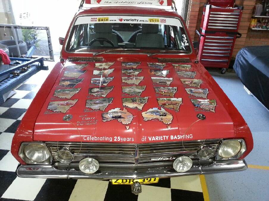 OLD FAITHFUL: 1966 Holden HR with its new bonnet decals showing Ian's 25 years of joining the Variety Bash.