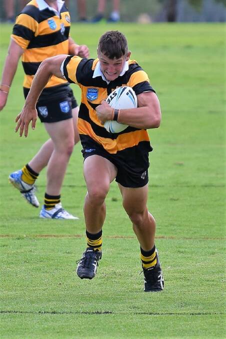 A Tigers on the attack during this season's Laurie Daley Cup campaign. Photo: Jason Smith.