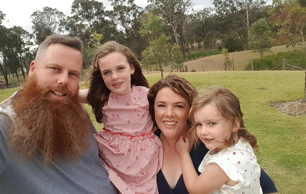 IN THE RUNNING: Daniel Repacholi with wife Alex and daughters Zoe and Asha. Picture: Supplied
