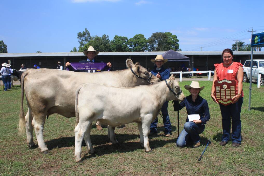 Supreme Exhibit of Show went to Compass Creek Murray Greys Katie Sutcliffe and her mother Lisa Bright with Glenliam Farm Greymist, holding the trophy Leonie Ball.