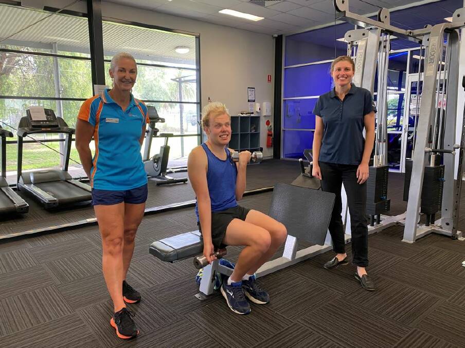 Singleton Gym & Swim health club manager Nicki Moody with Harry Kirkwood and Councils Community Development Officer Carly Hughes.