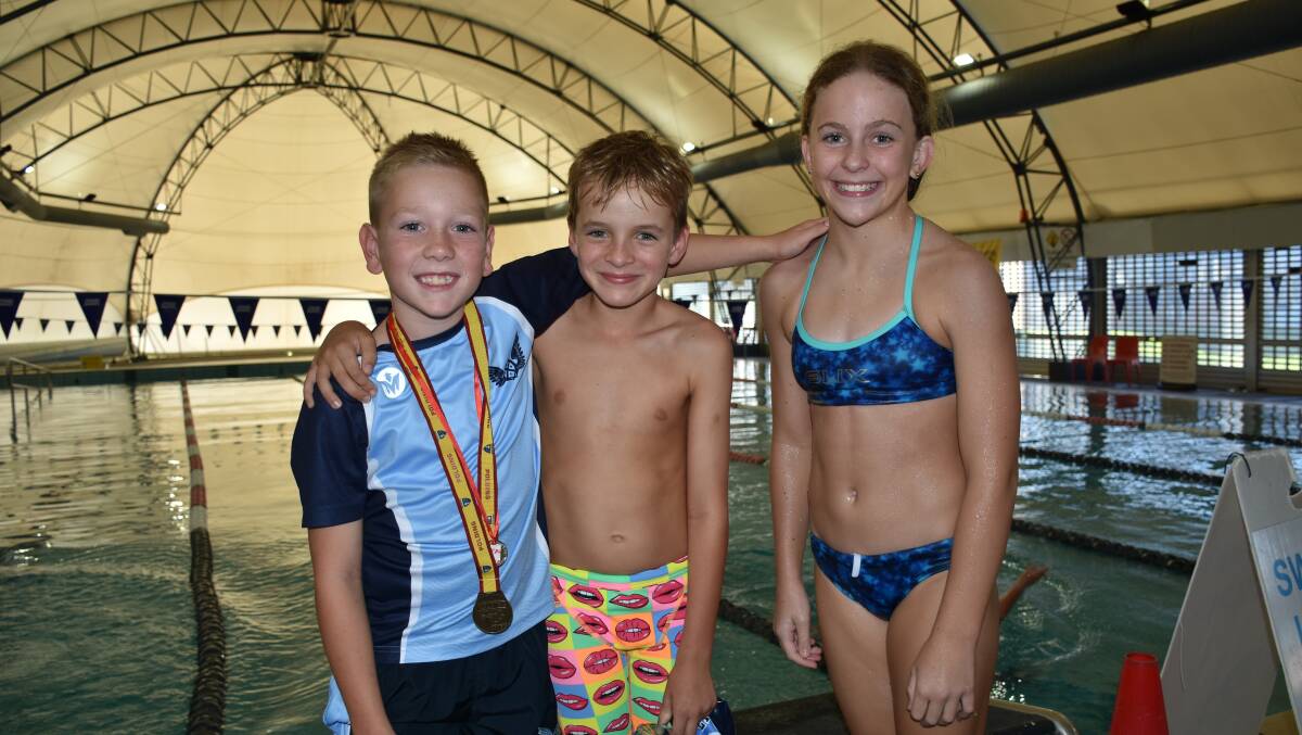 William Ryan, Alex Lalewicz and Brydie Gray all have a successful year in the pool. 