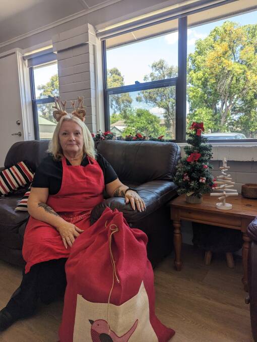 De-Anne Douglas OAM. She has been the co-ordinator, Muswellbrook Christmas Food and Toy Appeal, since 2000.