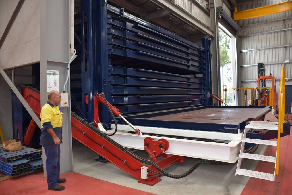 INNOVATION: Greg Hickey operates the material storage station at Hedweld's Mount Thorley manufacturing complex. The station designed by Hedweld is attracting interest from metal fabricators around the world.