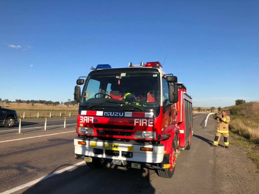 NSW Fire & Rescue check out a semi trailer on the New England Highway at Whittingham. Photo supplied.