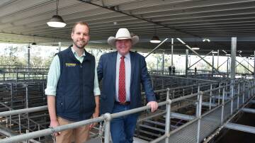 CAMPAIGN: The Nationals Hunter candidate James Thomson with Deputy Prime Minister Barnaby Joyce at the Singleton livestock selling centre.