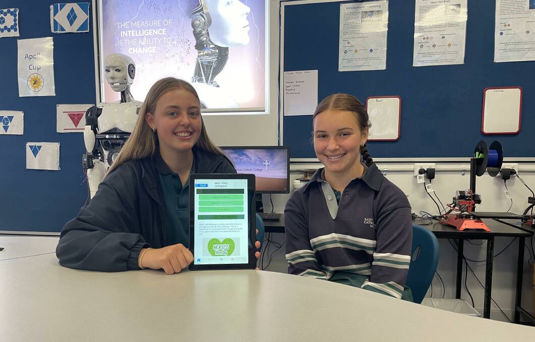 Bella Hoswell and Kelsey Jenkins with their app 'Meat Free Mondays'. 