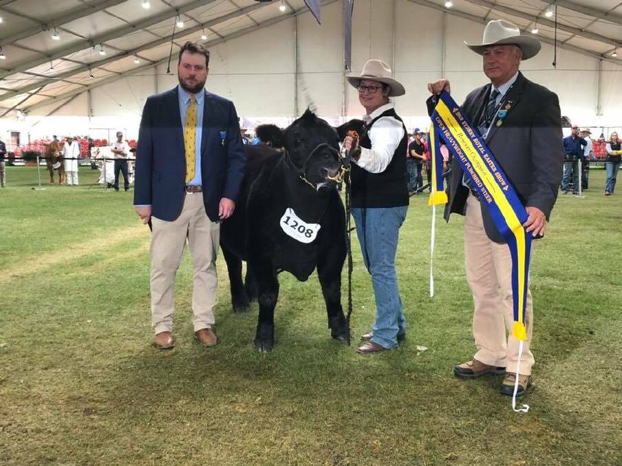 Judge Judge Ben Davies from Thomas Foods International and Lyn Richards at the halter. Photo supplied