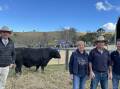 Auctioneer Paul Dooley with Pam Farragher, Jim Tickle and Rory Farragher of Banamba Angus who purchased the top price bull Sugarloaf Moe R111 for $26,000 at Sugarloaf Angus. Photo: Samantha Townsend.