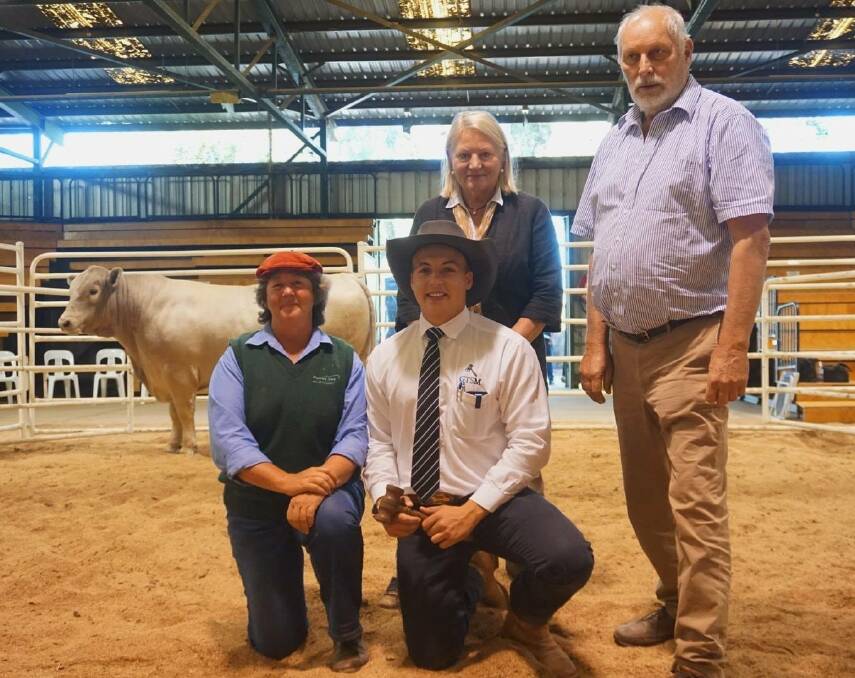 Top priced bull at the Murray Grey National Show and Sale was Onward Nougat pictured with breeder Sue Francis, Dorrigo and buyers Janet and Charles Wallace.