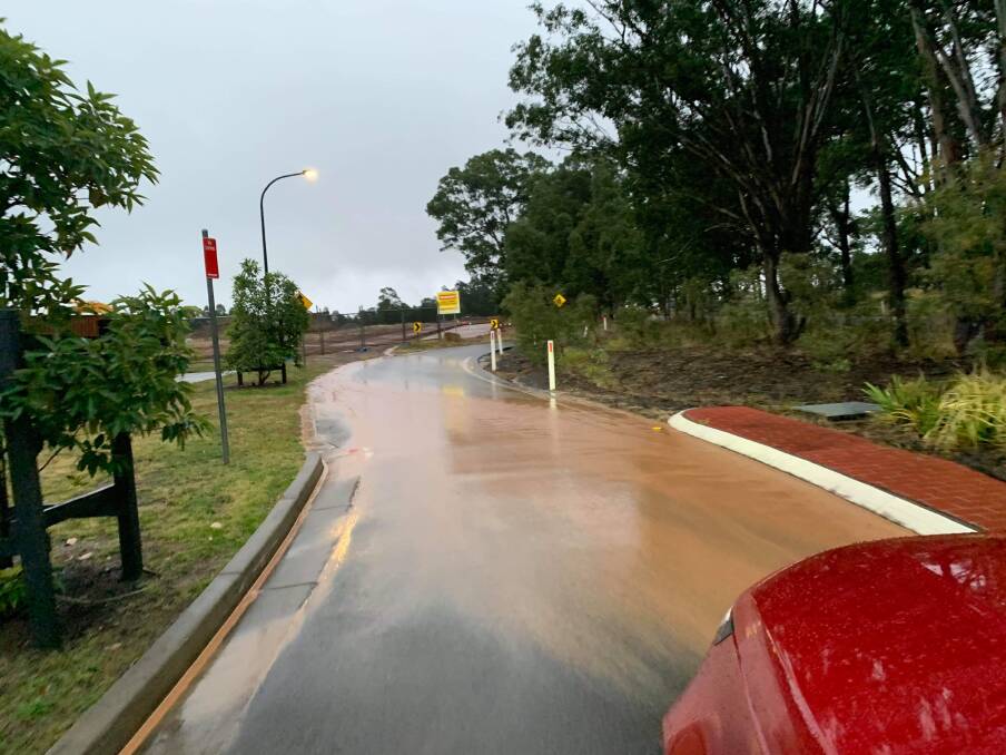 Wattle Ponds Road ( June 9) heading towards Glass Parade with runoff coming from the construction site of the new dual carriageway for Wattle Ponds Road. Photo supplied.