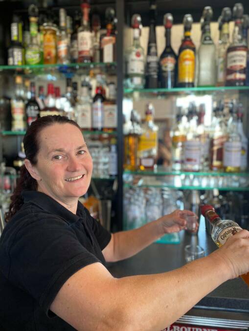 Supervisor Lindsay Davis working in the newly renovated bar.