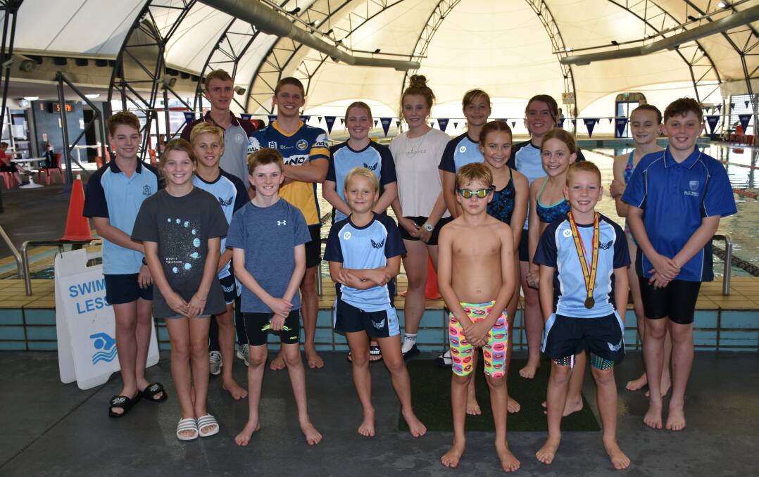 Squad members enjoying great success in the pool at regional and state swimming competitions in 2021.