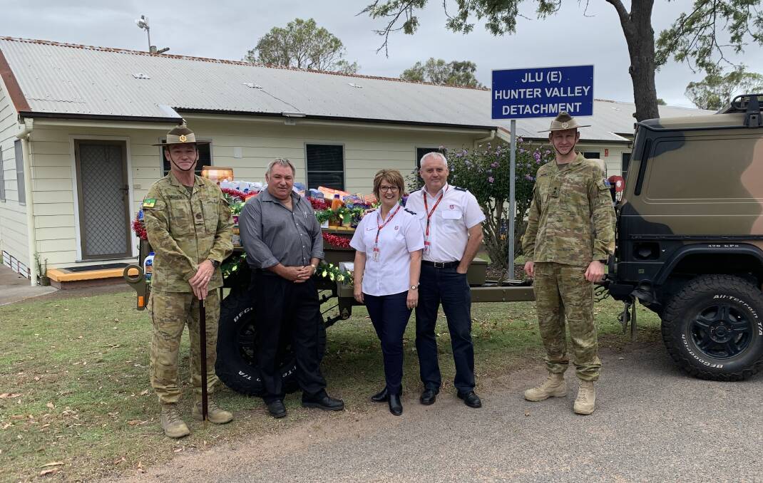 Singleton Army Base, RSM John Stonebridge, John Burke, officer in charge Joint Logistic Unit - East, Salvation Army's Val and David Hopewell and Singleton Army Base Commander Lt Col. James Smith.