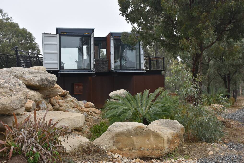 DISTINCTIVE: The cellar door complex at Running Horse Vineyard, Broke constructed from six shipping containers.