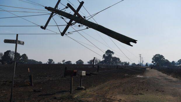 The fire brought down power cables at Uarbry and along the Golden Highway to Dubbo. Photo: Nick Moir