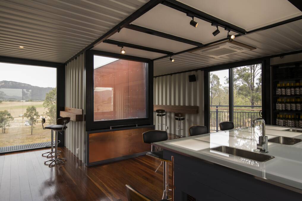 TRANSFORMED: A shipping container redesigned as a cellar door with great views towards Broke's Yellow Rock.