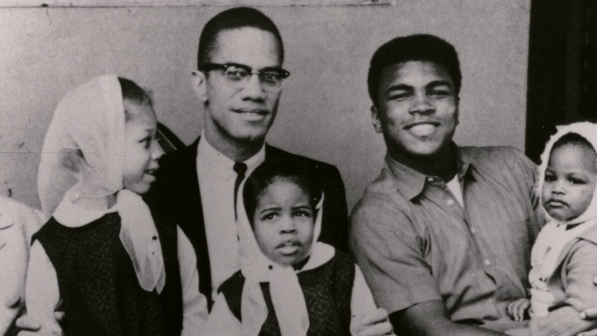 Malcolm X and Muhammad Ali with their daughters, in Blood Brothers. Picture: Netflix