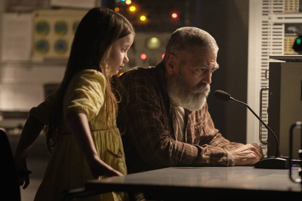 Caoilinn Springall as Iris, left, and George Clooney as Augustine in Midnight Sky. Picture: Netflix