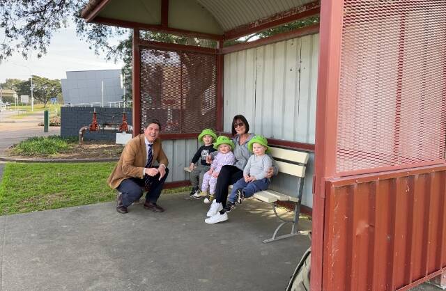 UPGRADES: Dave Layzell with Heather Hill from Lillypad Daycare and the next generation of public transport commuters Jonathan, Kiara and Vinnie.