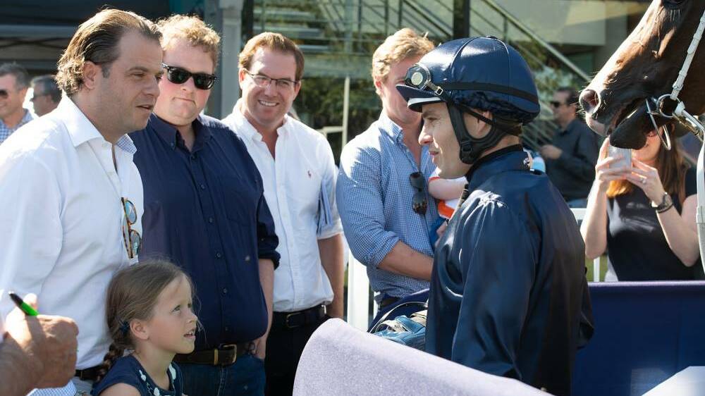 IMPRESSED: Coolmore’s Australian boss Tom Magnier chats with Singleton jockey Aaron Bullock after Lady Shalott's victory in the Miss Finland Two-Year-Old at Muswellbrook on Friday. Pic: KATRINA PARTRIDGE PHOTOGRAPHY