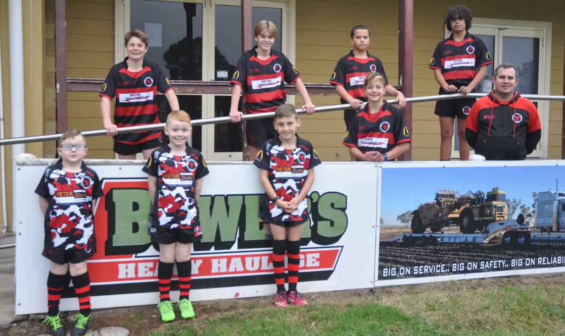 KEEN AS: Singleton Junior Rugby president Matt Merrick with promising youngsters, back, Hamish OBrien, Hugh Partridge, Tipene Paniora, Jackson Paniora; and, front, Henry Richardson, Jack Richardson, Henry Cooper and Maronay Smuts.