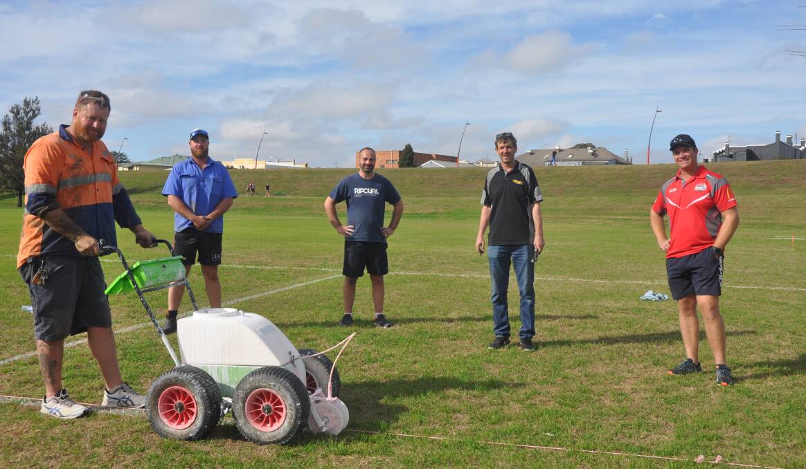 NEW SEASON LOOMS: Singleton Junior Rugby League president Kevin Lomax (left) prepares Cook Park, along with Mitchell Nott, Antony Palmer, Shayne Brumby and Kurt Rudder, in readiness for the first round of the competition.